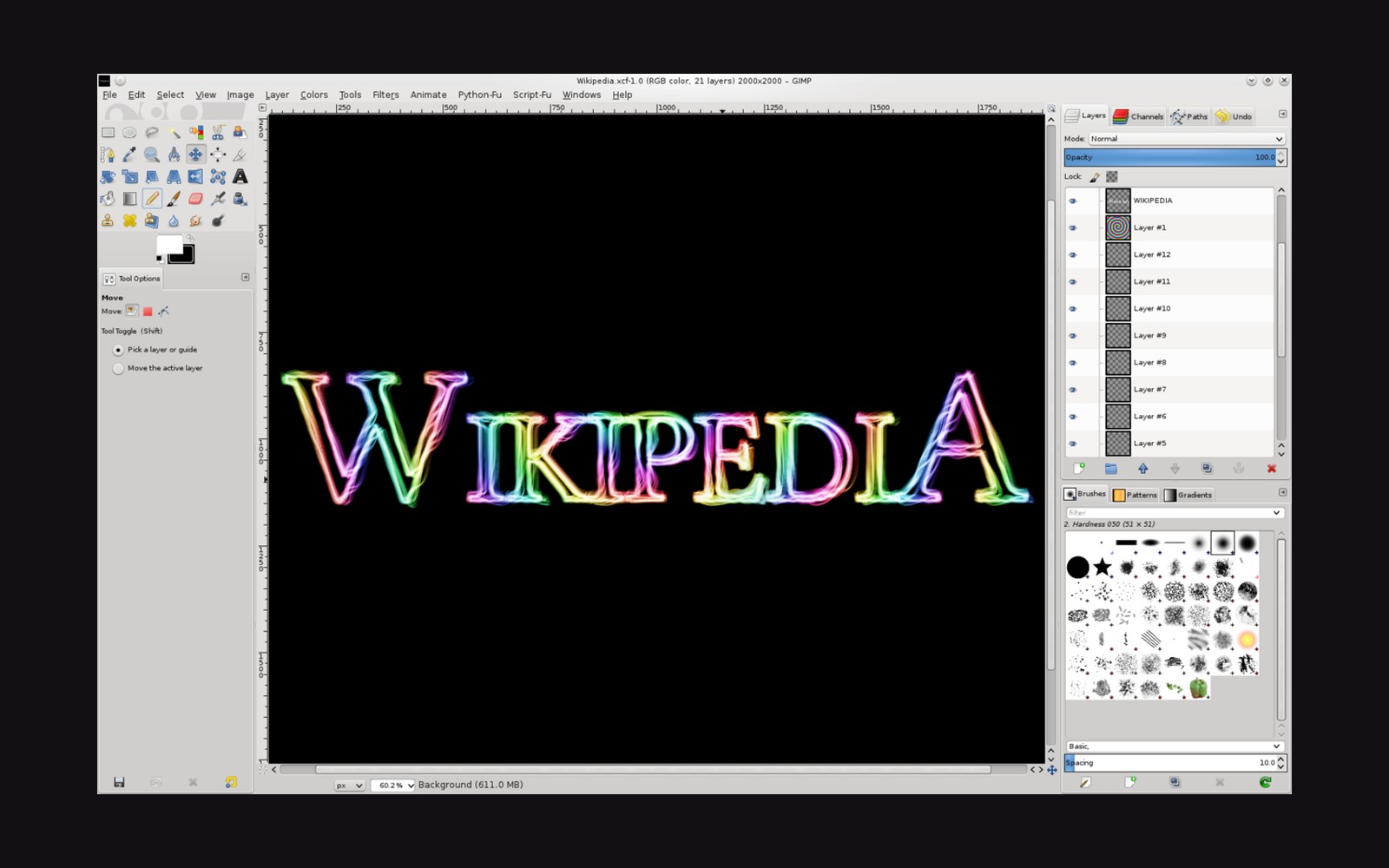 GIMP editing a rainbow-colored "Wikipedia" text logo with multiple layers listed in the panel